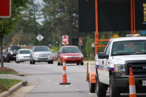 Blythe Construction is out on Catawba Avenue painting direction signs on the pavement as the DDI gets closer and closer to completion.